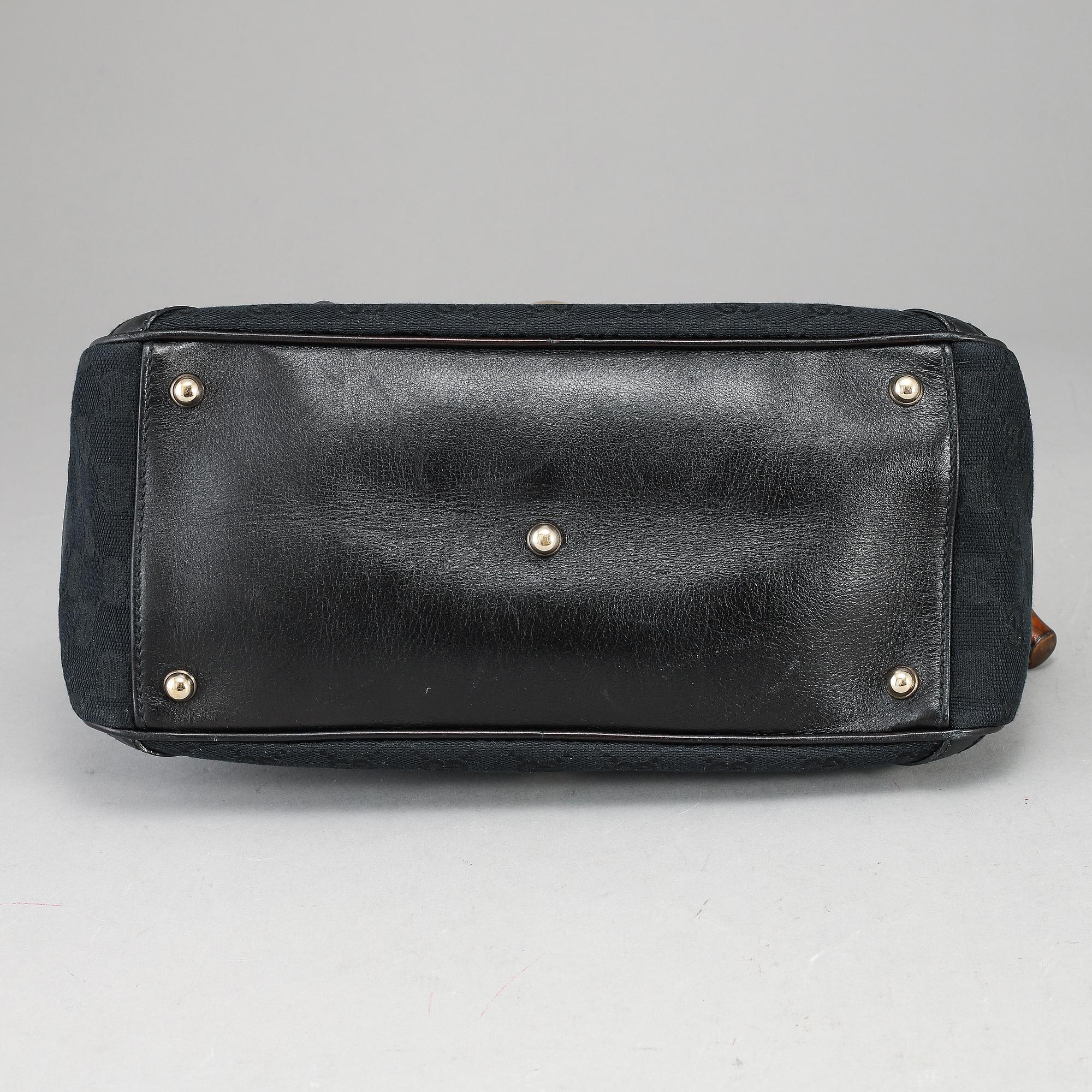 GUCCI, 'GG Canvas Horsebit Wave Handbag'.