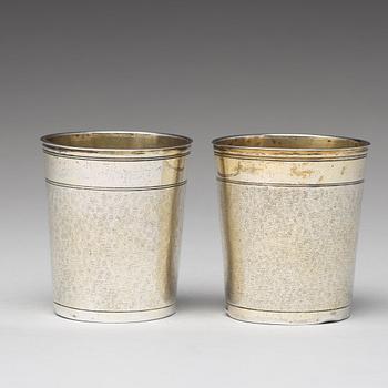 A matched pair of German 17th century parcel-gilt silver, Augsburg (1627-1665).