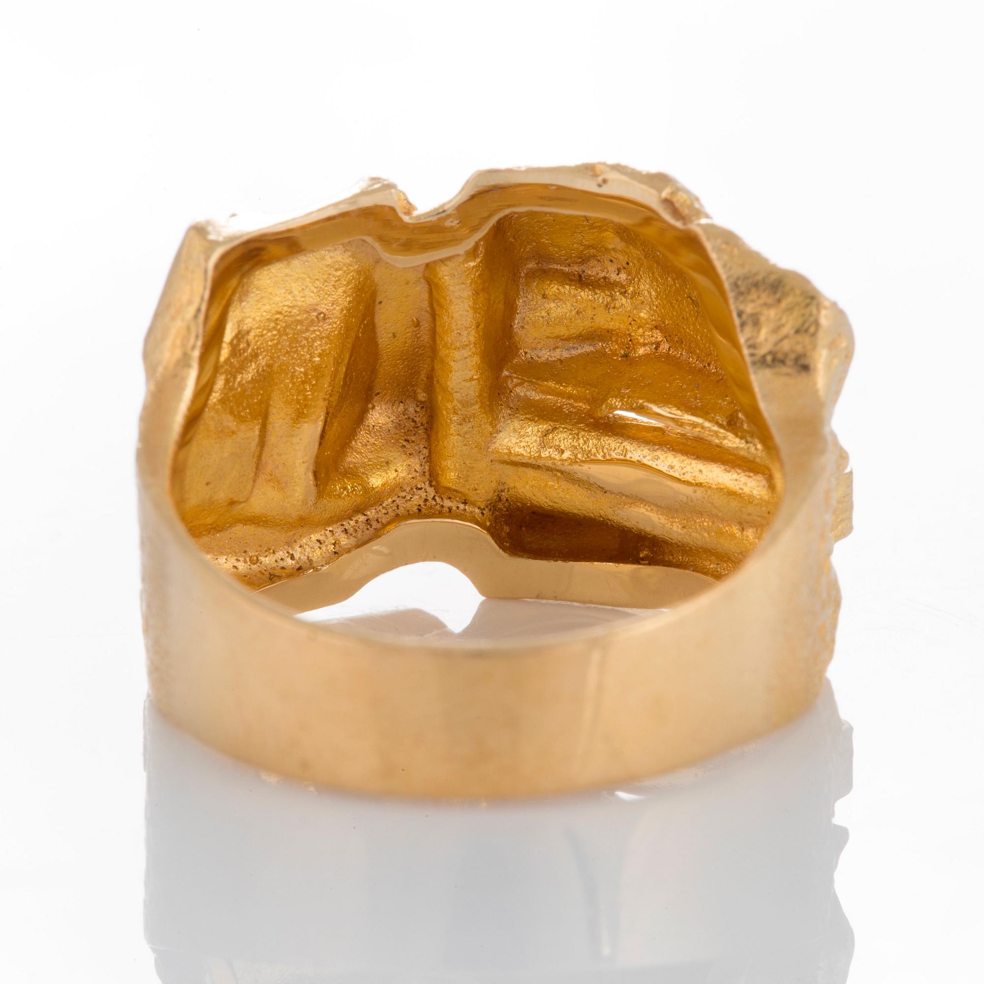 Björn Weckström ring "Tourmaline Bridge" 18K guld med en grön turmalin.