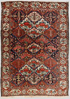 A CARPET, semi-antique Bakhtiari, around 314 x 212 cm.