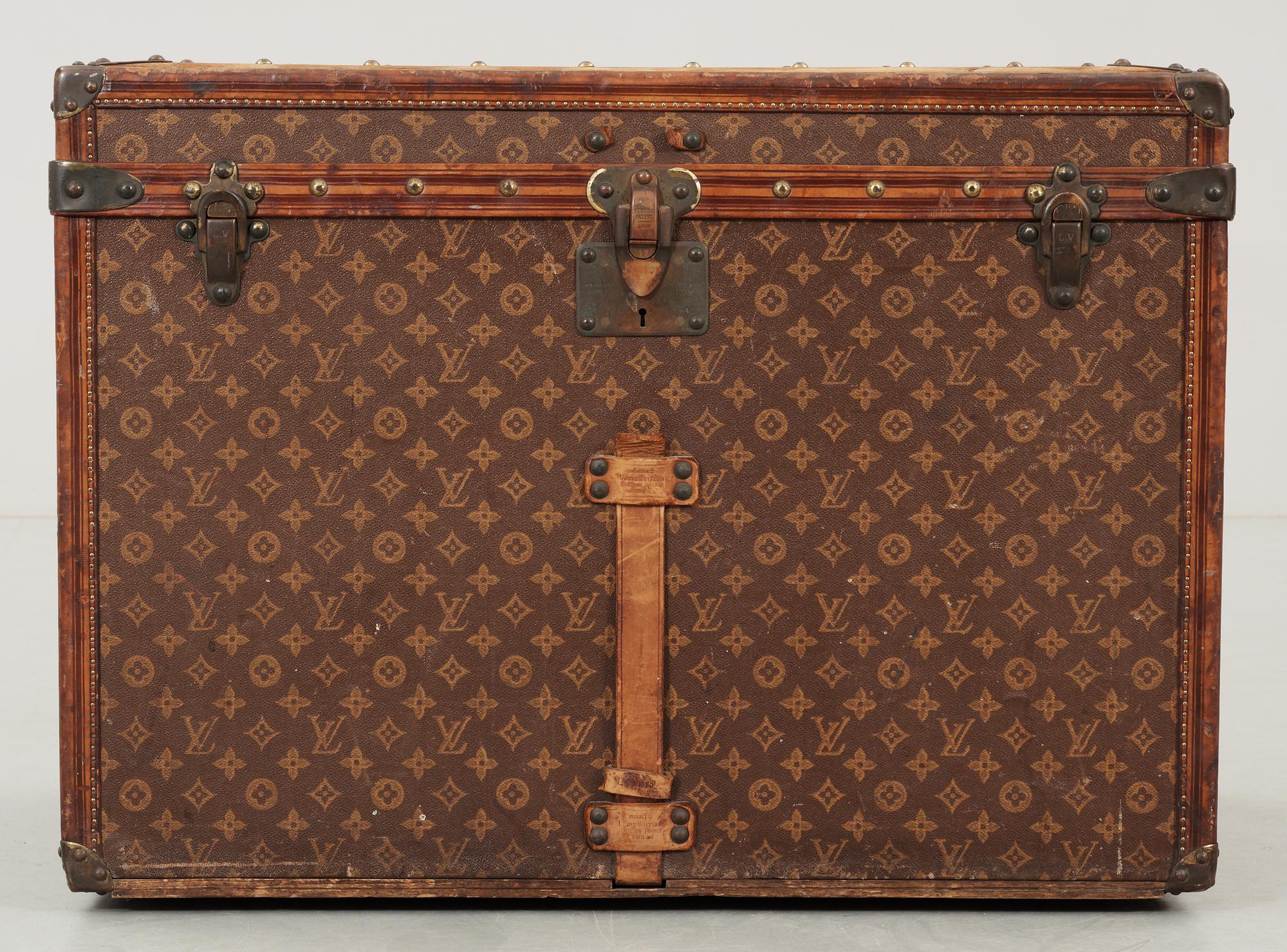 An early 20th cent monogram canvas trunk by Louis Vuitton.