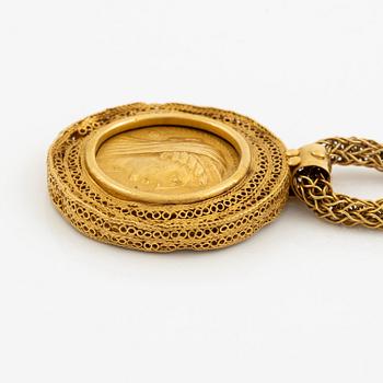 A necklace 18K gold set with a gold coin.