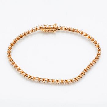 Tennisarmband 18K guld med runda briljantslipade diamanter totalt ca 1,56 ct.