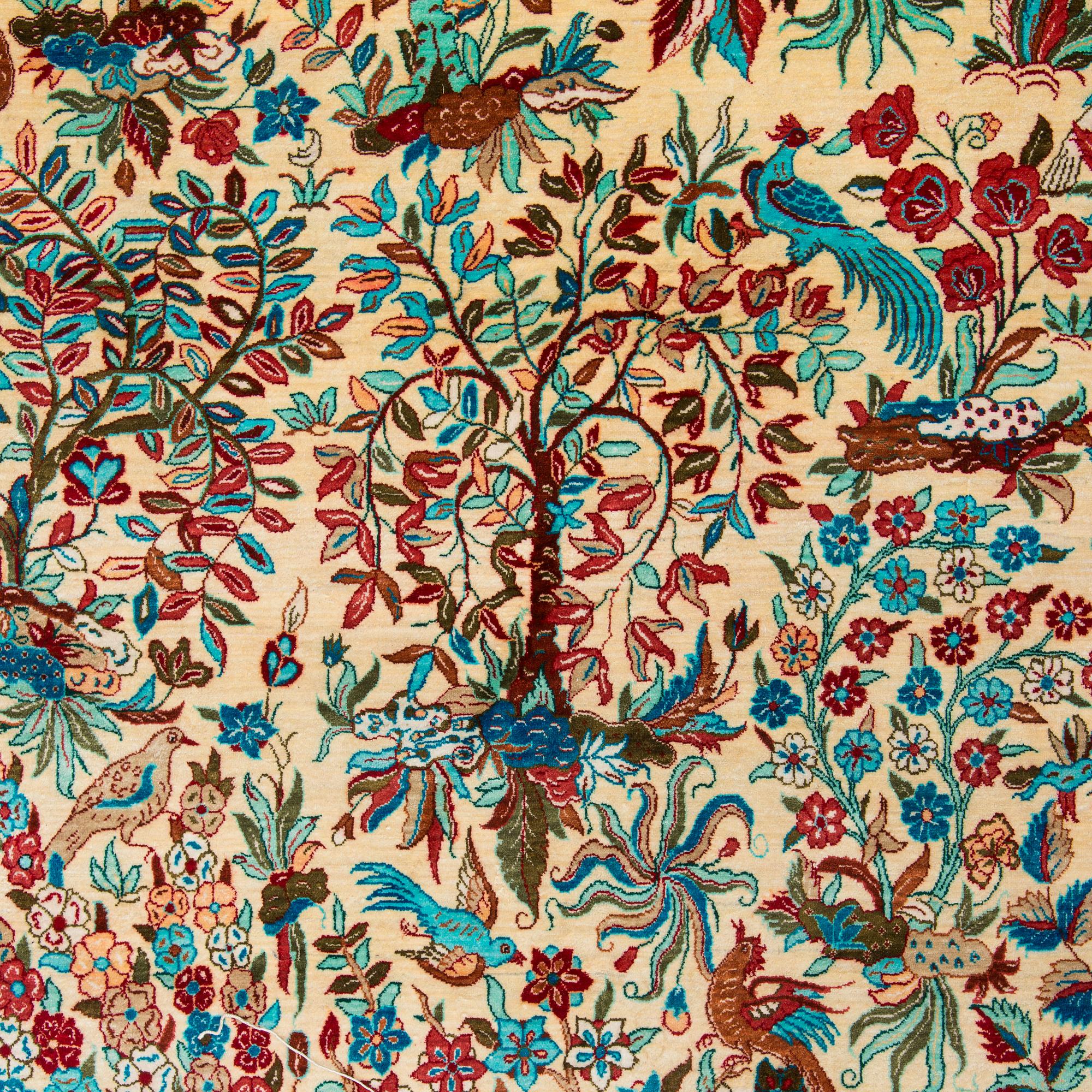 A silk Qum rug, central Persia, c. 210 x 138 cm.