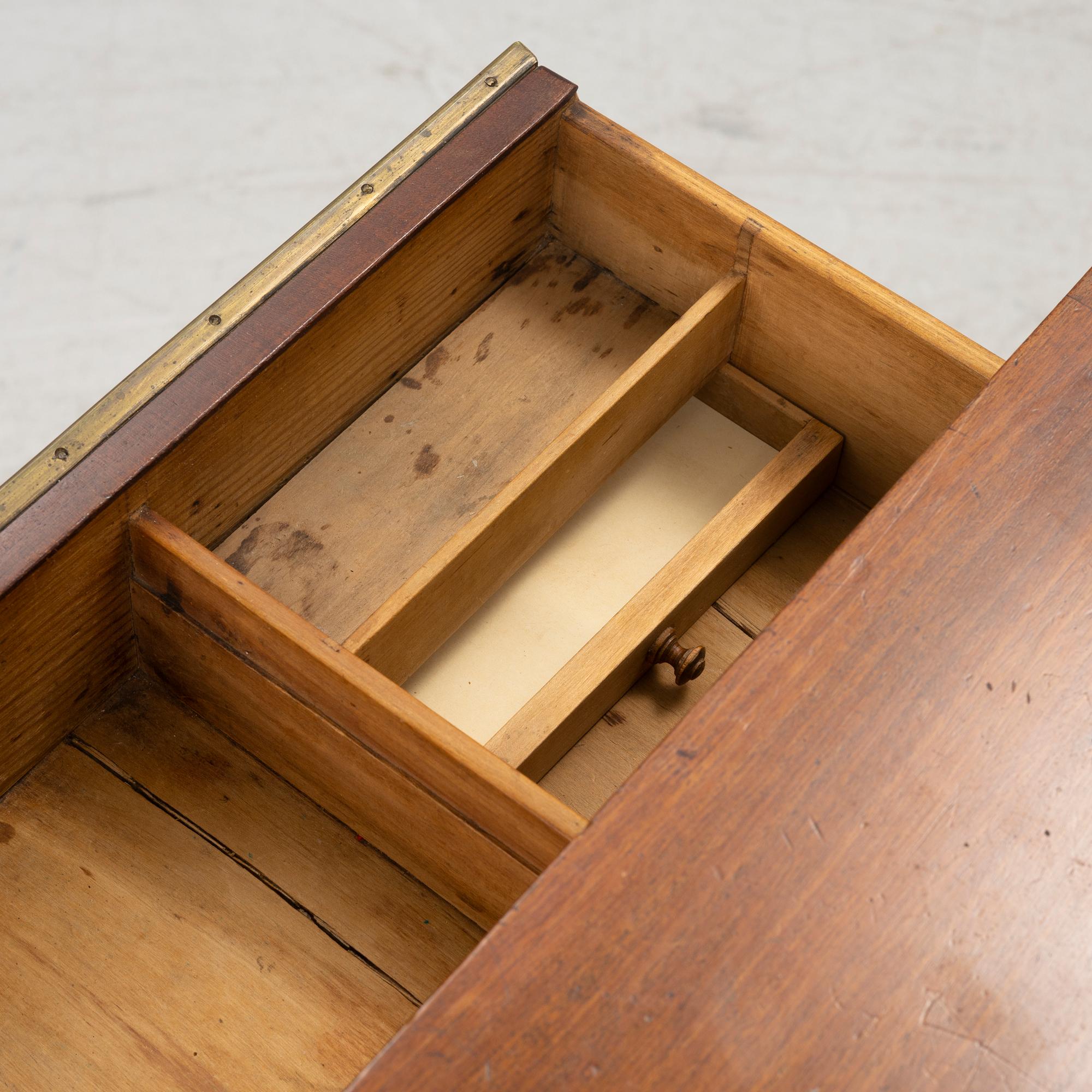 A late Gustavian mahogany writing table from araound the year 1800.