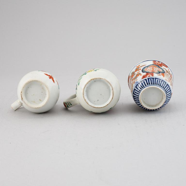 Two famille rose export porcelain jugs and a Japanese Imari bowl, Qing dynasty, Qianlong and Meiji.