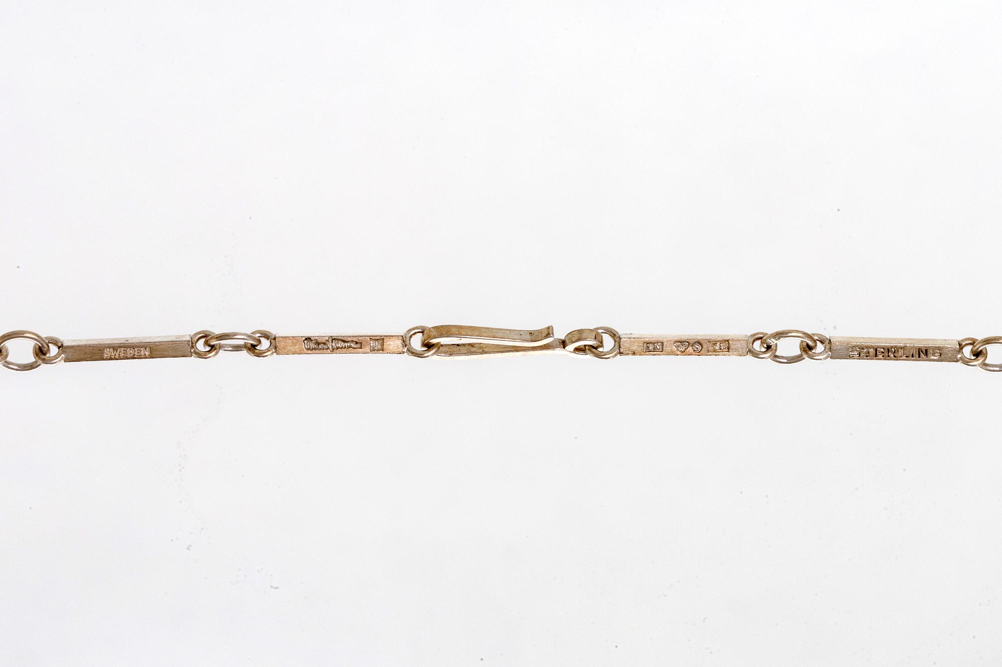 Wiwen Nilsson, pendant on chain, sterling silver, two rock crystal sapprox 15 x 15 mm each, Lund 1945.
