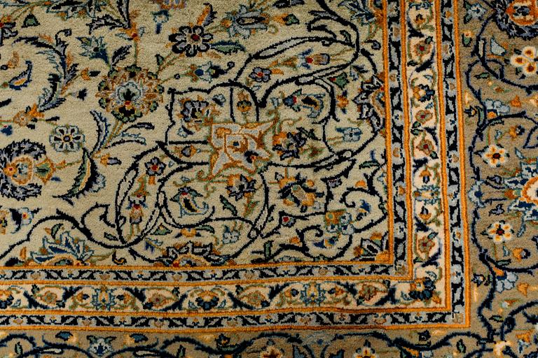 A Keshan rug, signed, ca 370 x 268 cm.