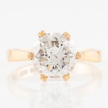 Ring 18K gold with a round brilliant-cut diamond.