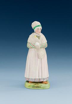 A Russian figure of a Lett woman, Gardner/Kuznetsov manufactory, ca 1900.