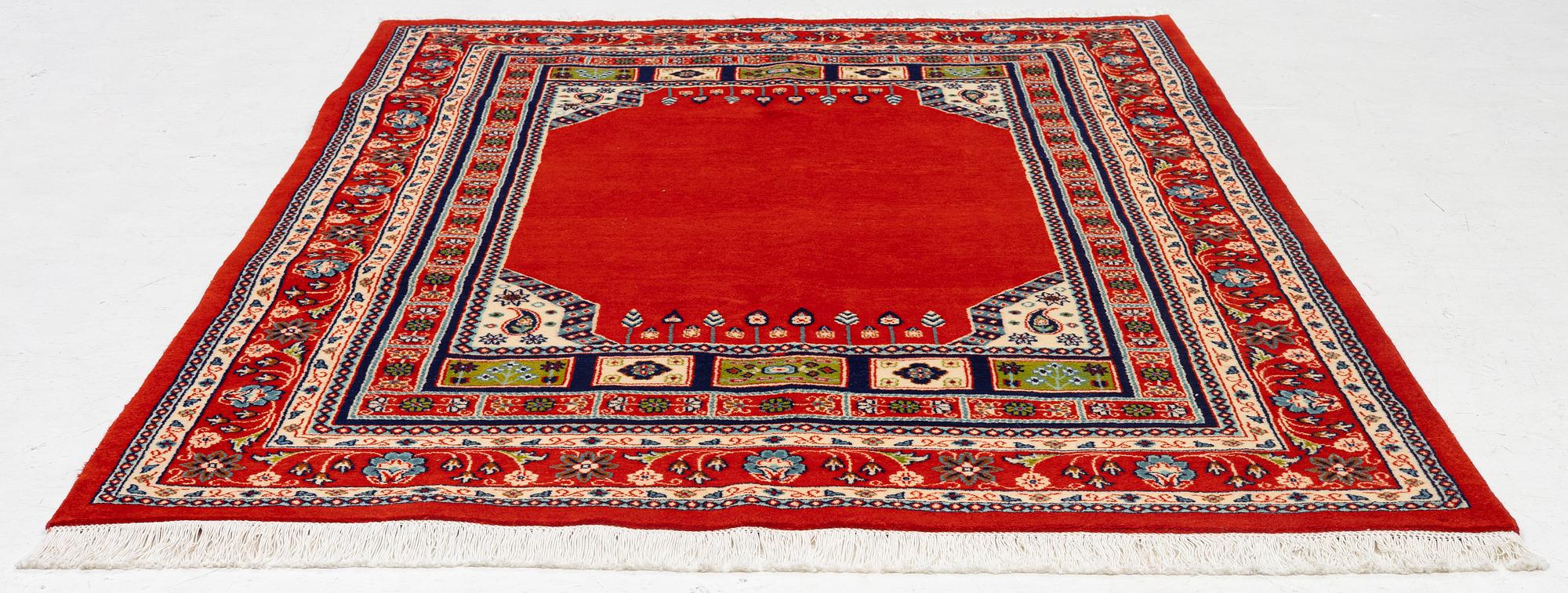 A Kashmar carpet, c. 236 x 168 cm.