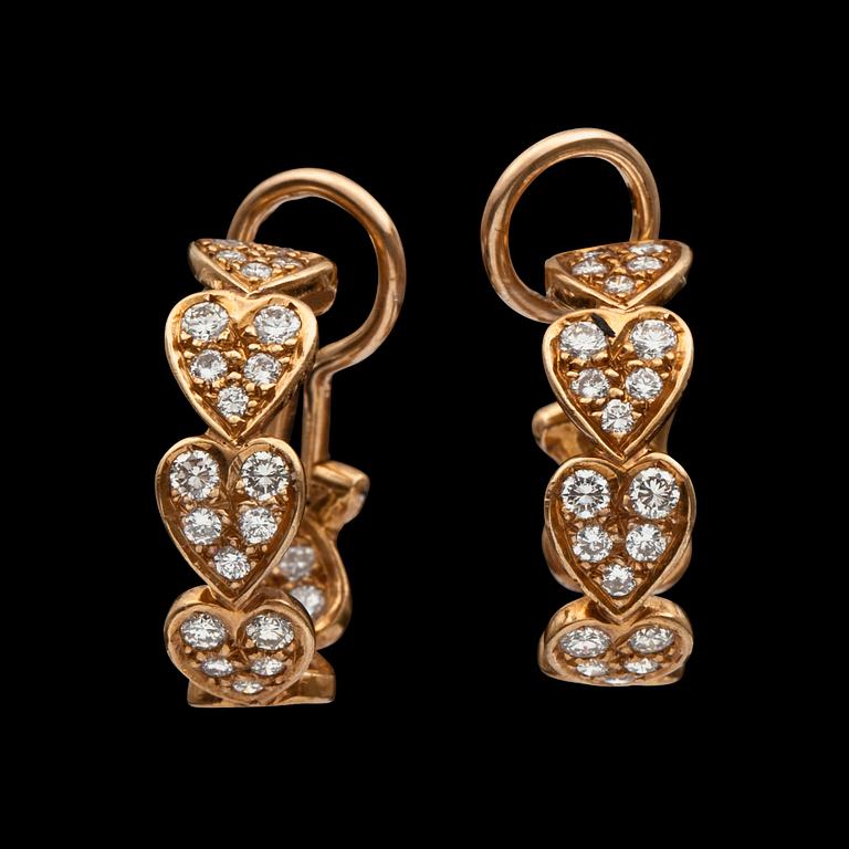 A pair of Cartier diamond earrings. No. 273679. Total carat weight of diamonds circa 1.20 cts.