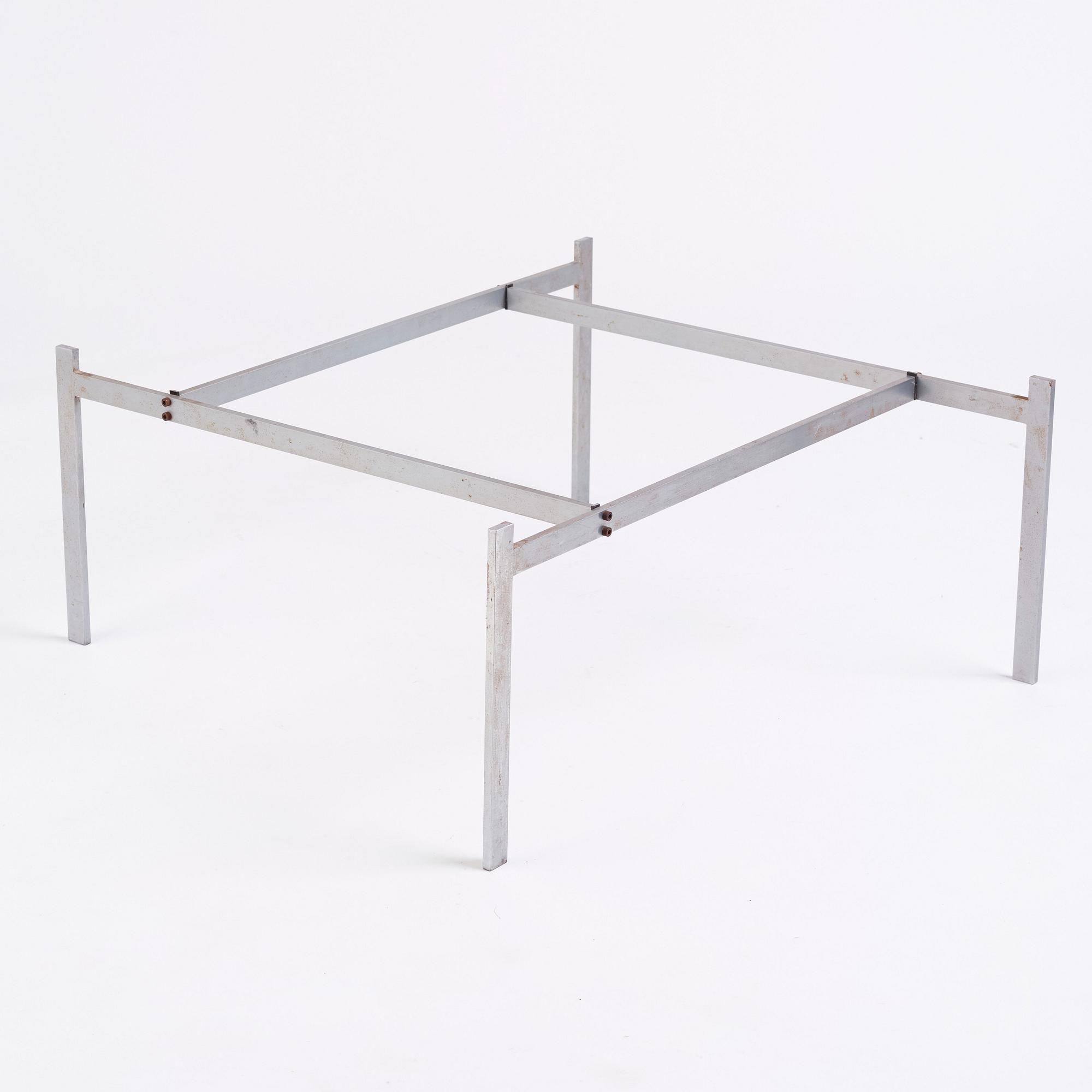 Poul Kjaerholm, a 'PK61' labradorite/larvikit stone top sofa table, edition E Kold Christensen, Denmark, early 1960s.