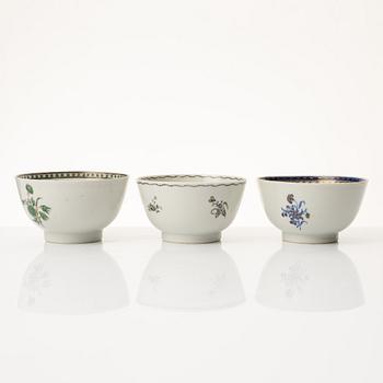 A group of nine Chinese export porcelain cups with stands, Qing dynasty, late 18th century.
