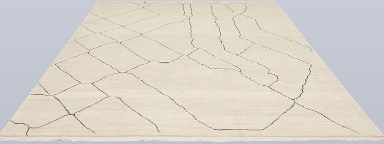 A Moroccan carpet, 305 x 251 cm.