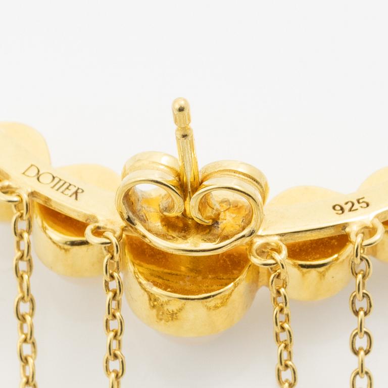 Maria Nilsdotter, a single earring, "rain earring" and a pair, silver with pearls and quartz.