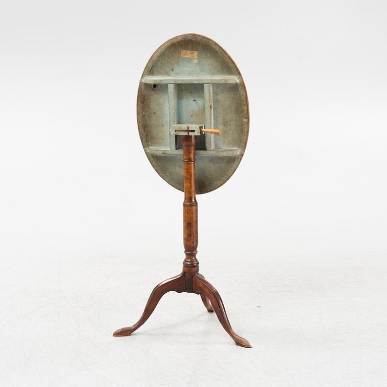 A small alder root veneered tilt top table by Lars Eric Lindell (1818-1843).