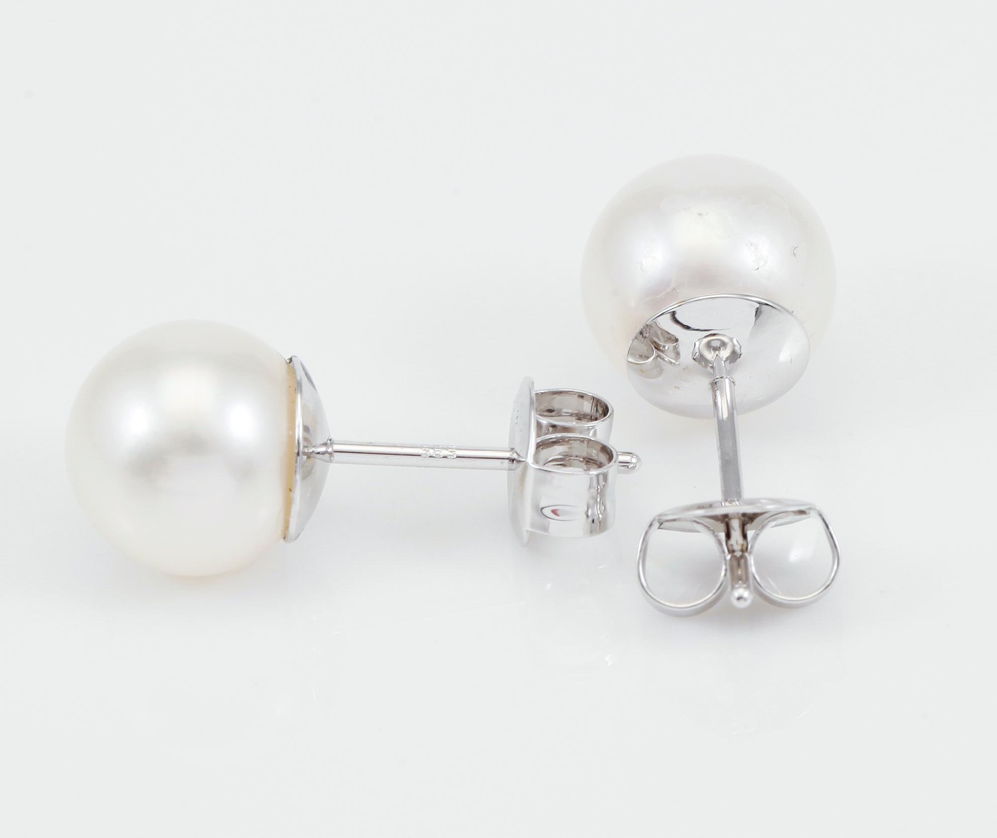 ÖRHÄNGEN, 1 par, vittonade odlade sötvattenspärlor.