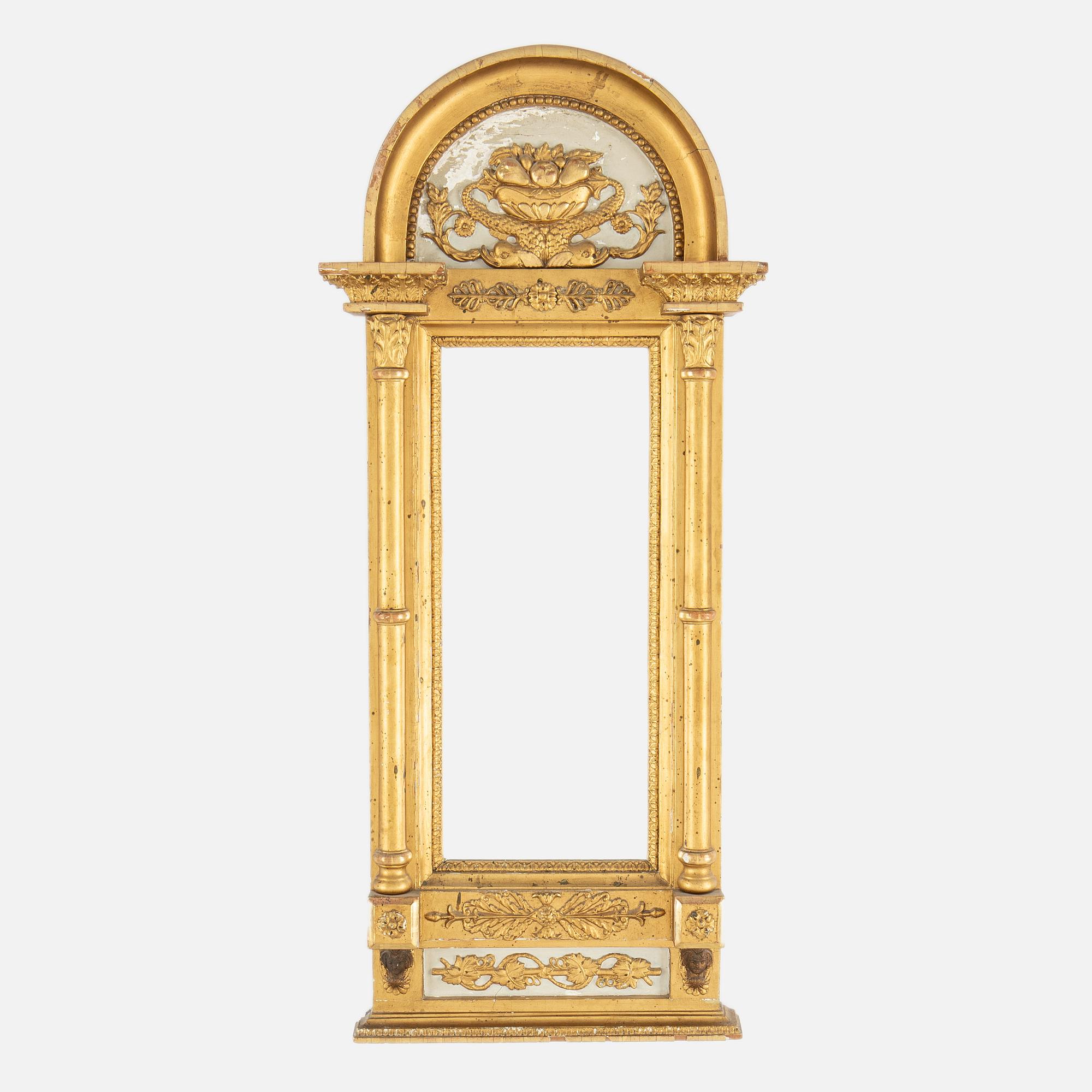 A lat Gustavian mirror from around  the year 1800.