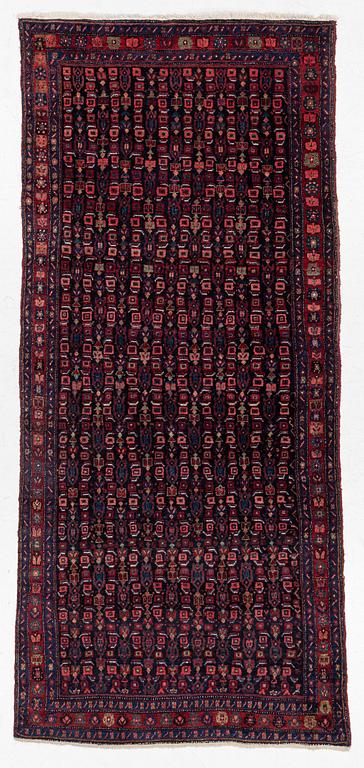 A semi-antique Bidjar carpet, c. 310 x 145 cm.