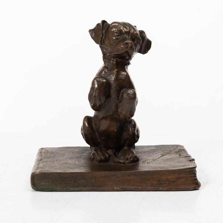 Ferdinand Notini, a bronze sculpture/paper weight, signed, 1908.