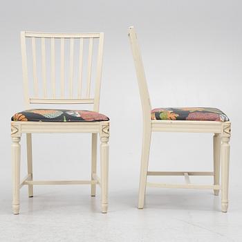 Dining table with six chairs, Gustavian style, second half of the 20th Century.