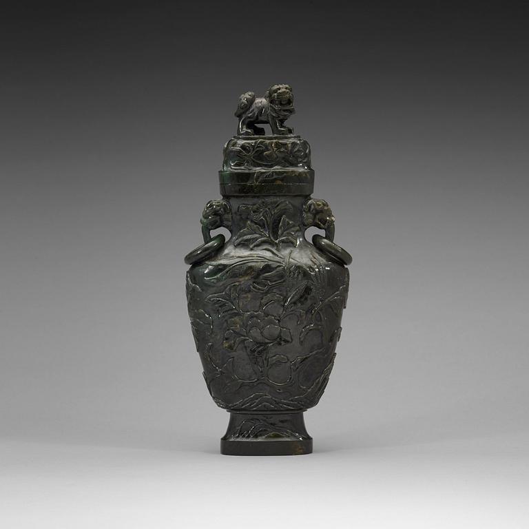 A Chinese carved stone vase, 20th Century.