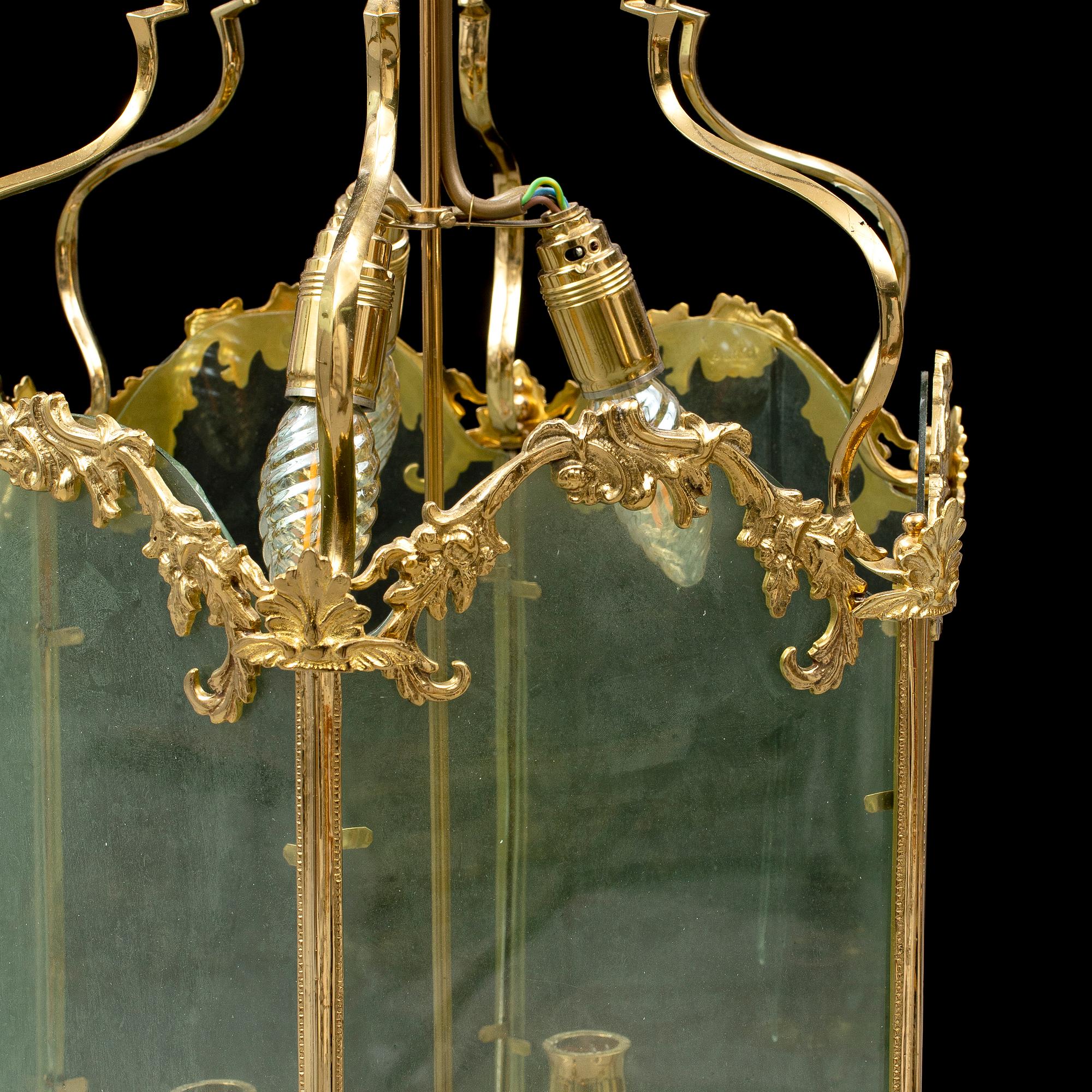 A brass ceiling light "Jubileumslyktan" by K.A. Jonsson, signed and dated 2002.