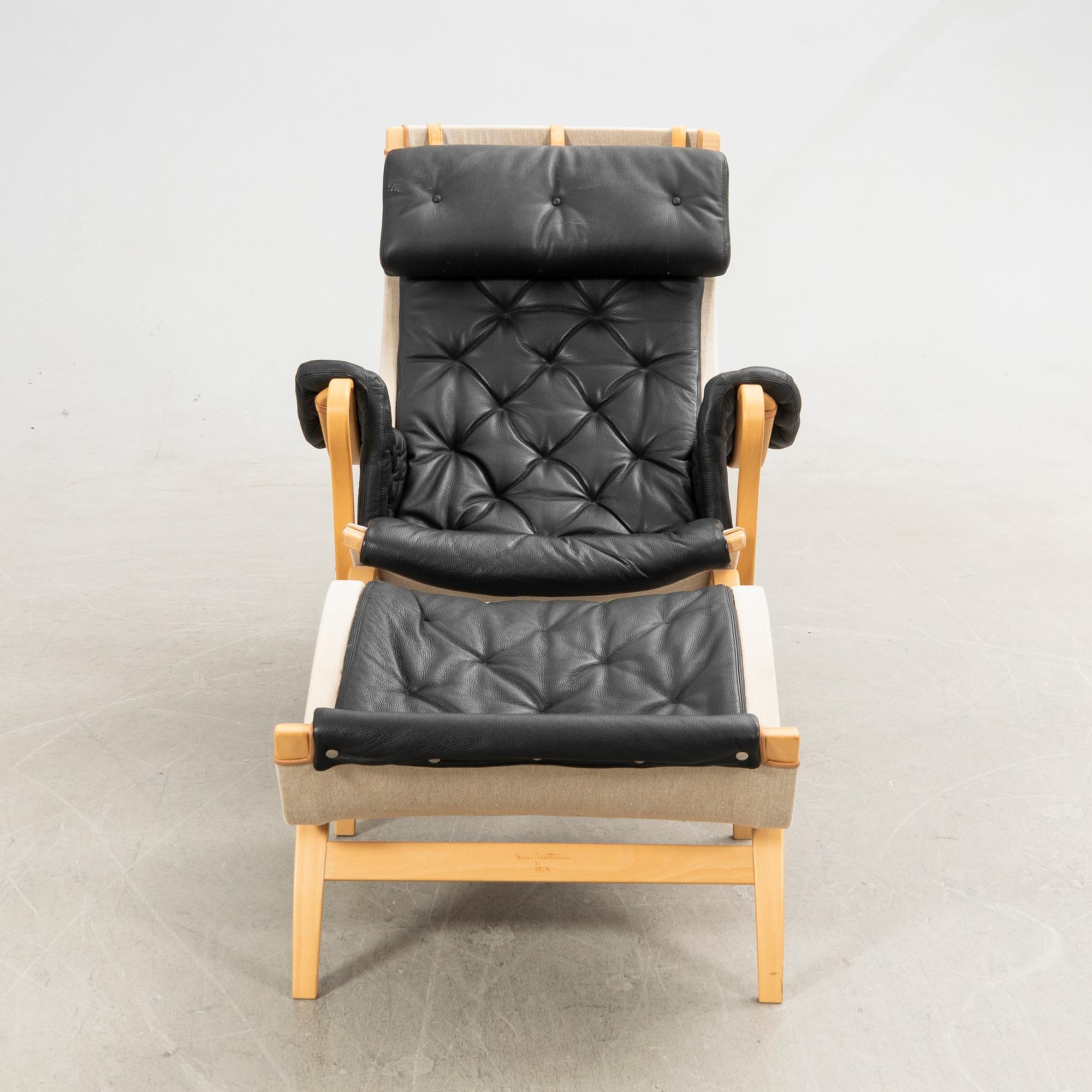 Bruno Mathsson, fåtölj med fotpall, "Pernilla", Dux.