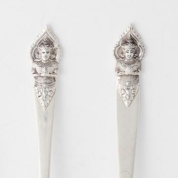 Four sterling silver servers, Thailand 20th century.