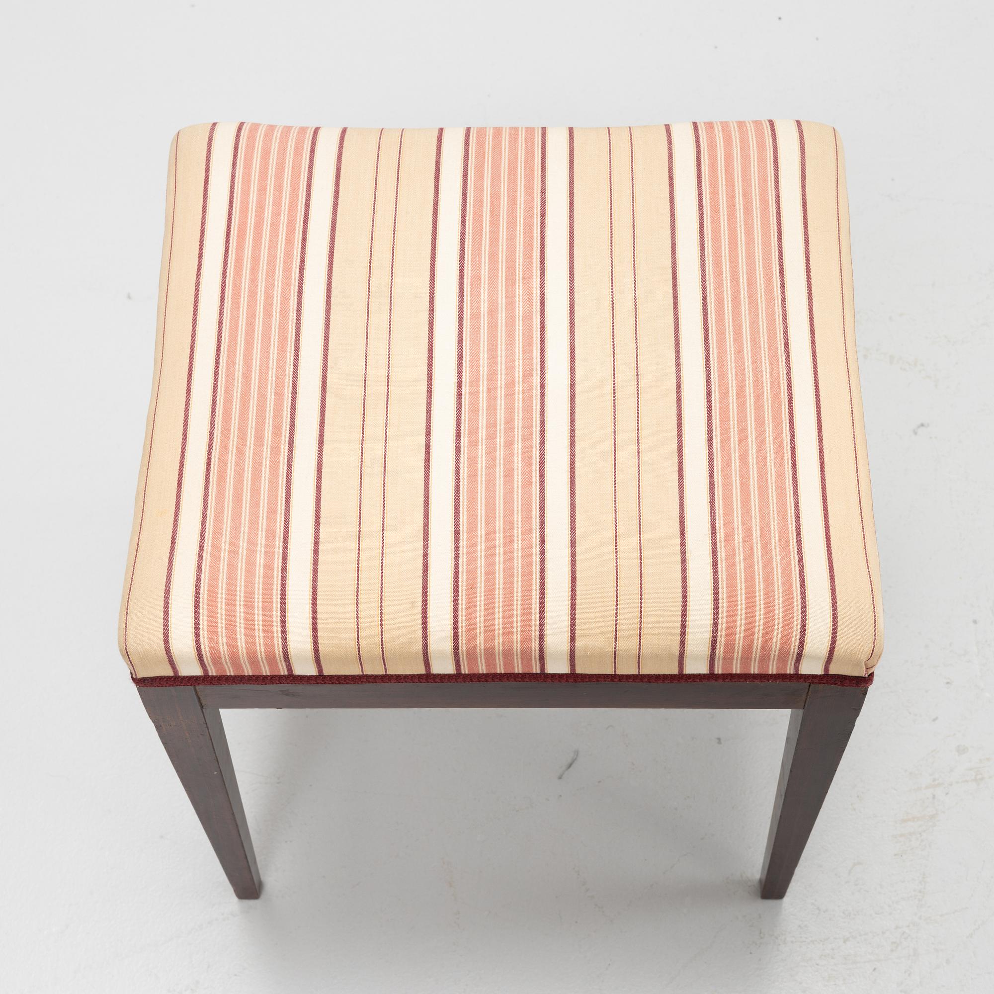 A group of five rosewood veneered chairs and a stool, mid 20th Century.