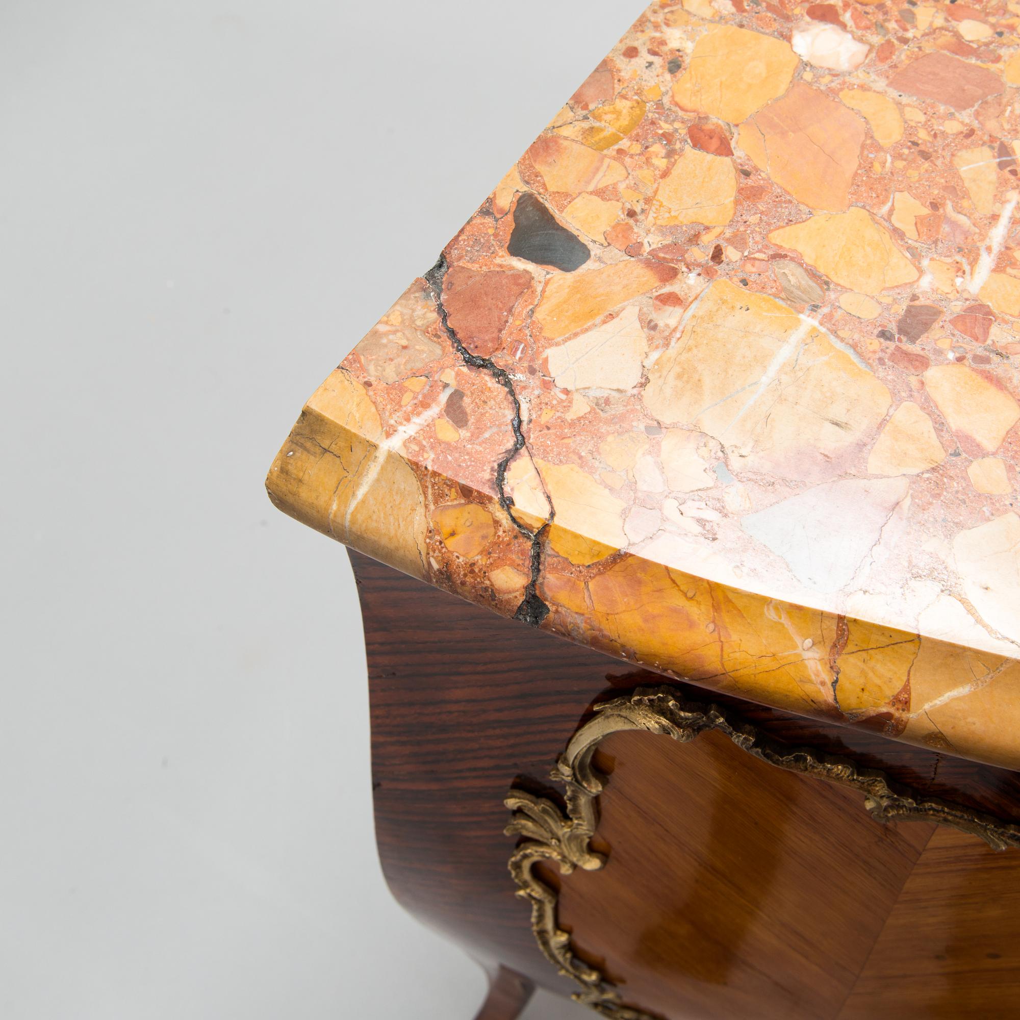 A chest of drawers plaque marked Les fils d'Alfred Wimphen Paris, early 20th century.