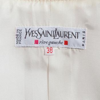YVES SAINT LAURENT, a two-piece white suit consisting of jacket and trousers.