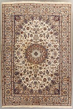 An old Kerman carpet ca 349 x 242 cm.