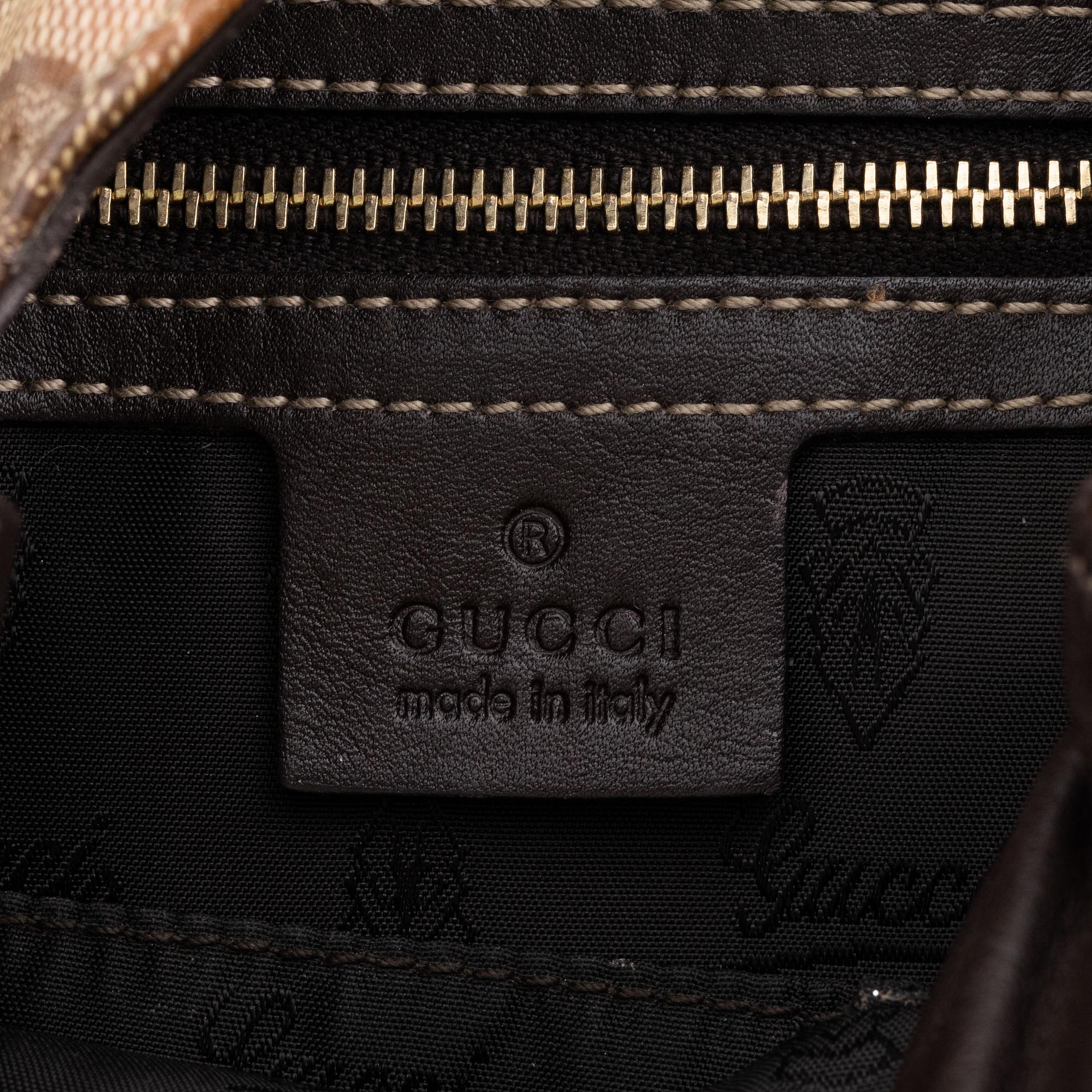 Gucci, a canvas handbag.