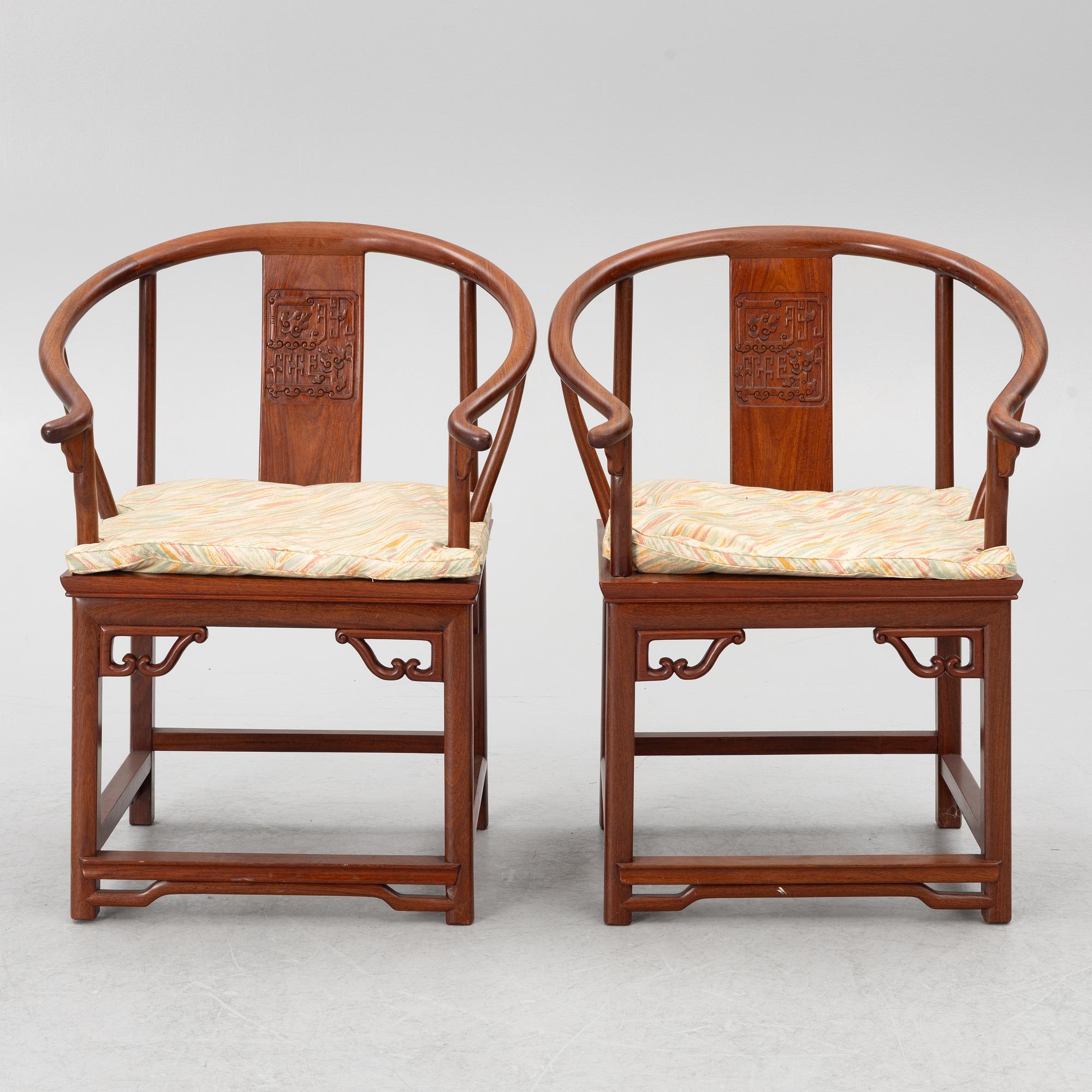 A pair of hardwood 'horse shoe back' hardwood armchairs, Hong Kong, 1960s.