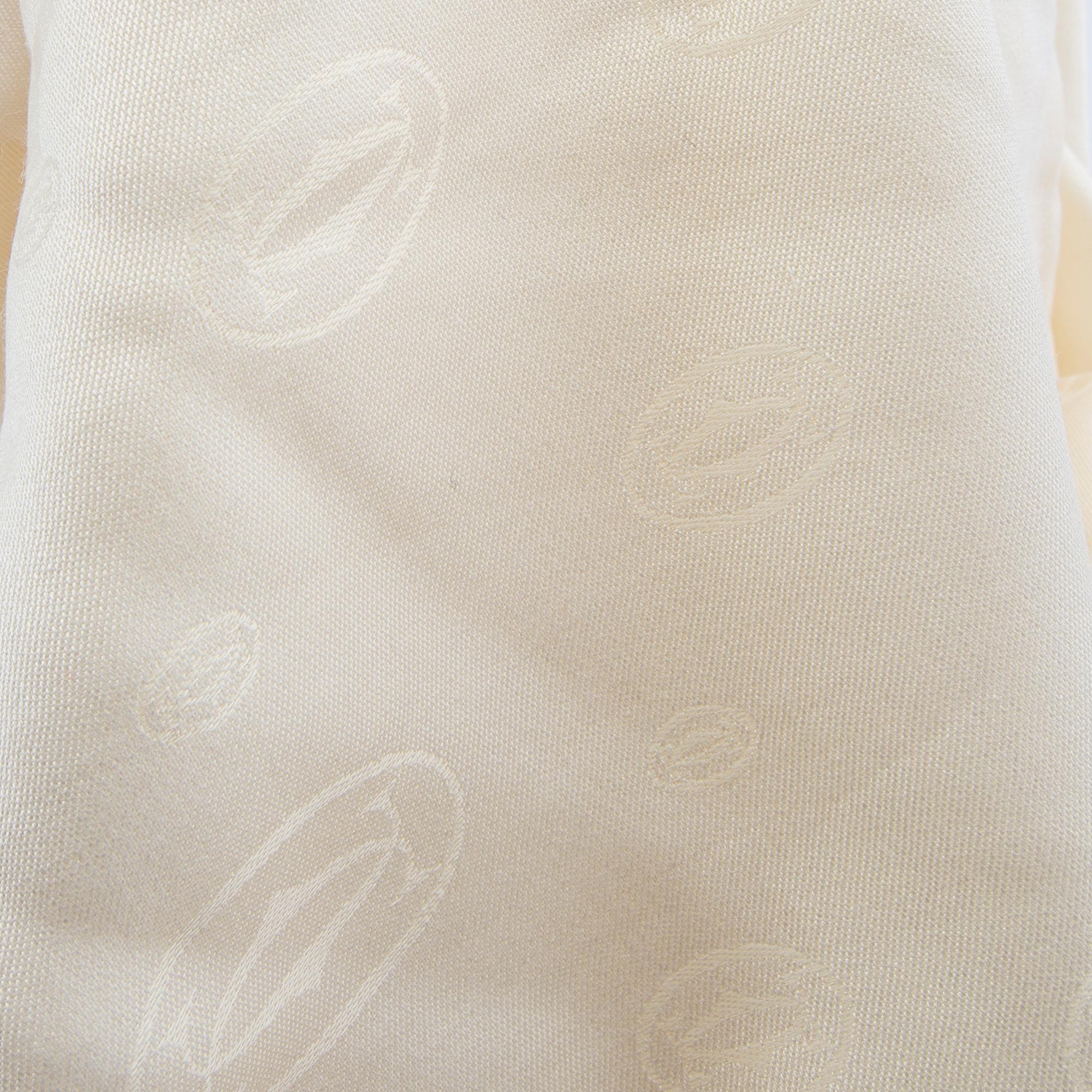 Cartier, a wool/silk scarf.