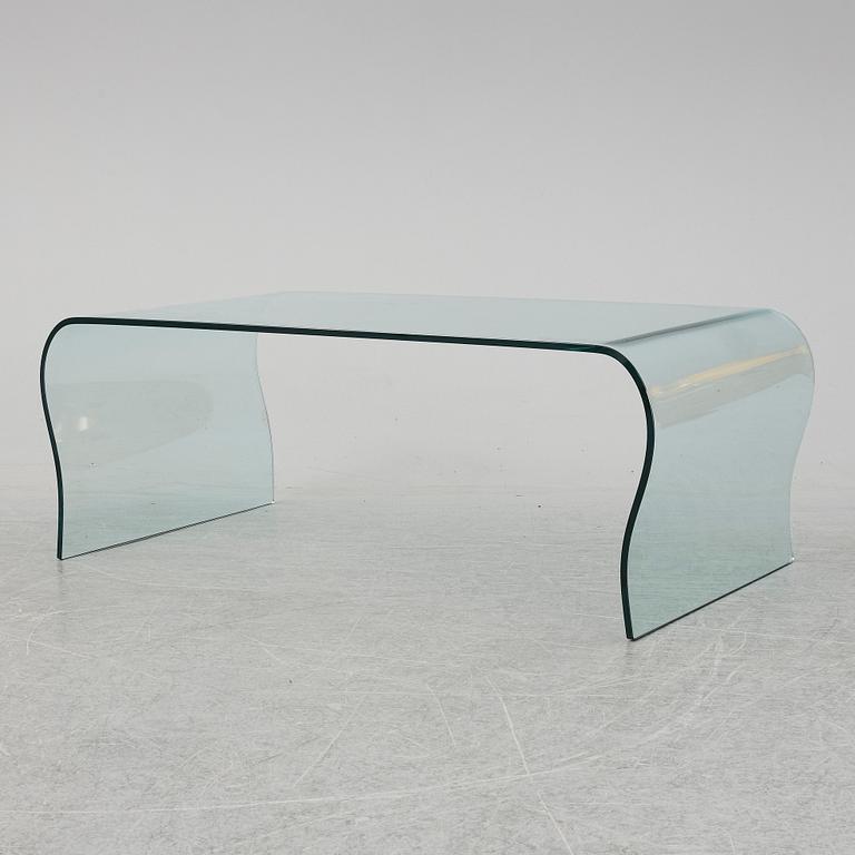 A mid 20th Century glass coffee table.