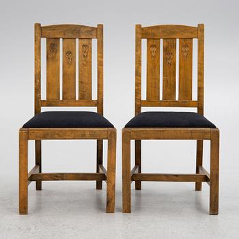 Carl Westman, attributed, a pair of stained birch wood chairs. Early 20th century.