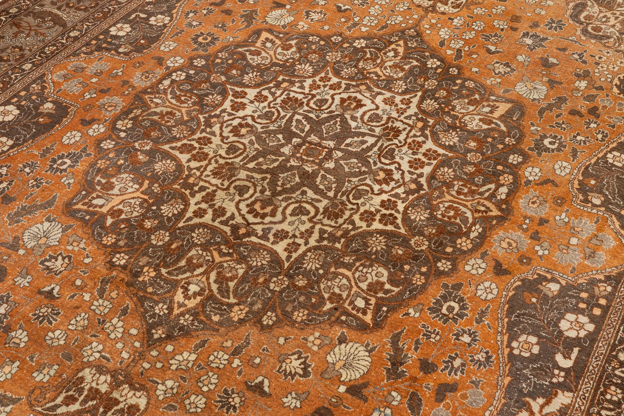 An antique Tabriz carpet, Northwest Persia, 453 x 310 cm.