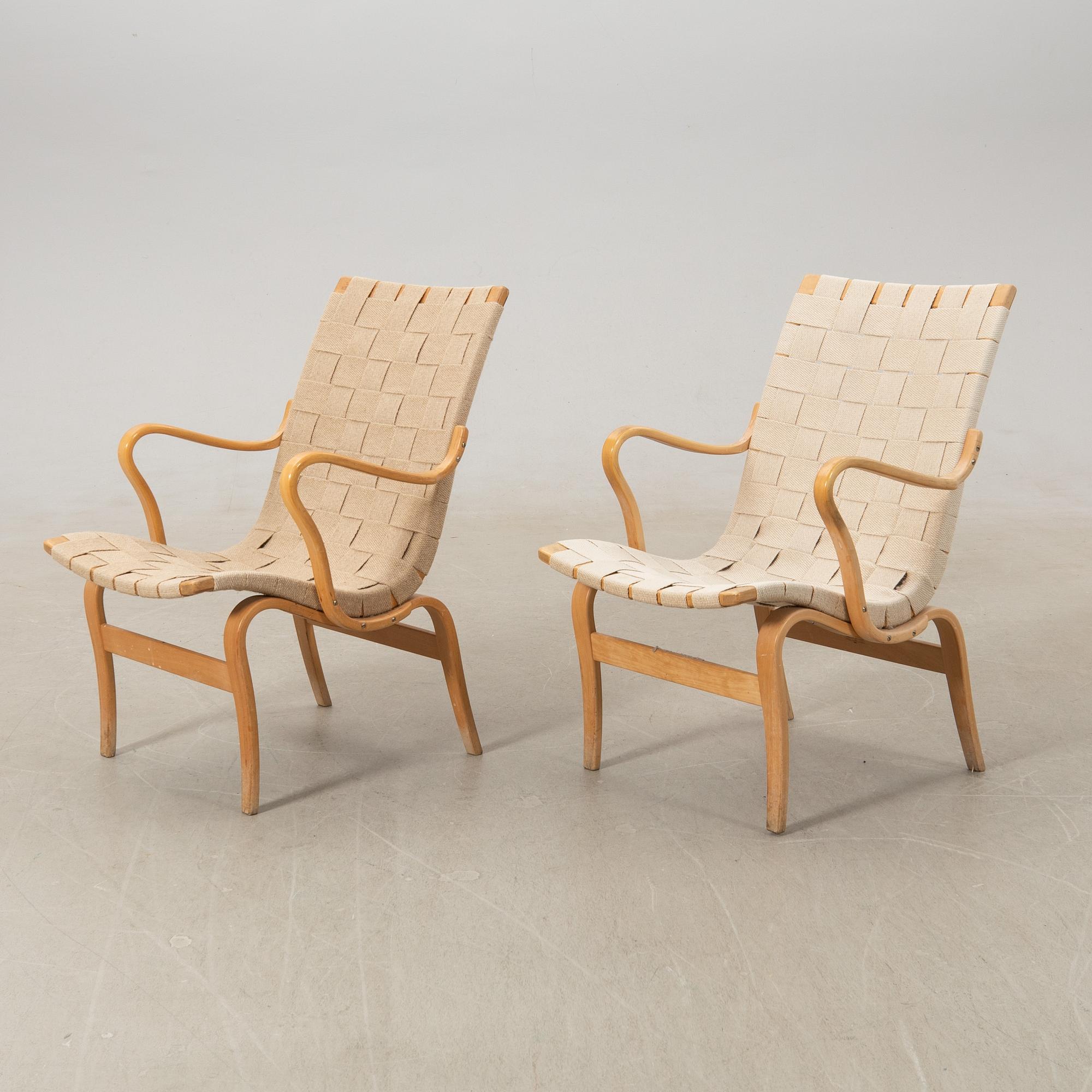 Bruno Mathsson, a pair of "Eva" armchairs, Bruno Mathsson Company, Värnamo, late 20th century.