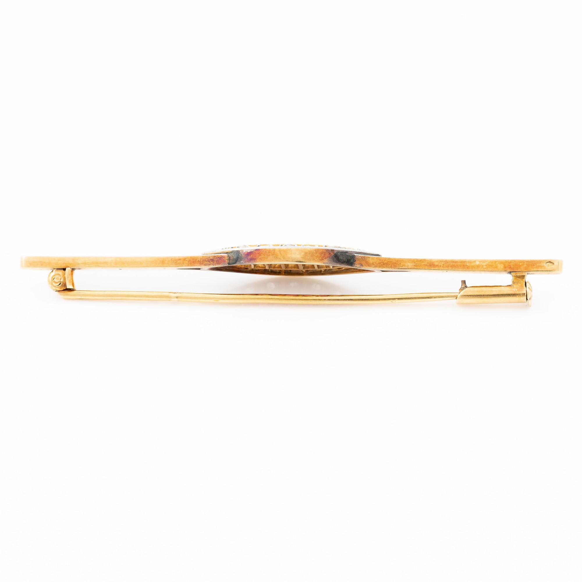 Brooch, 18K gold set with rose-cut diamonds and rubies.