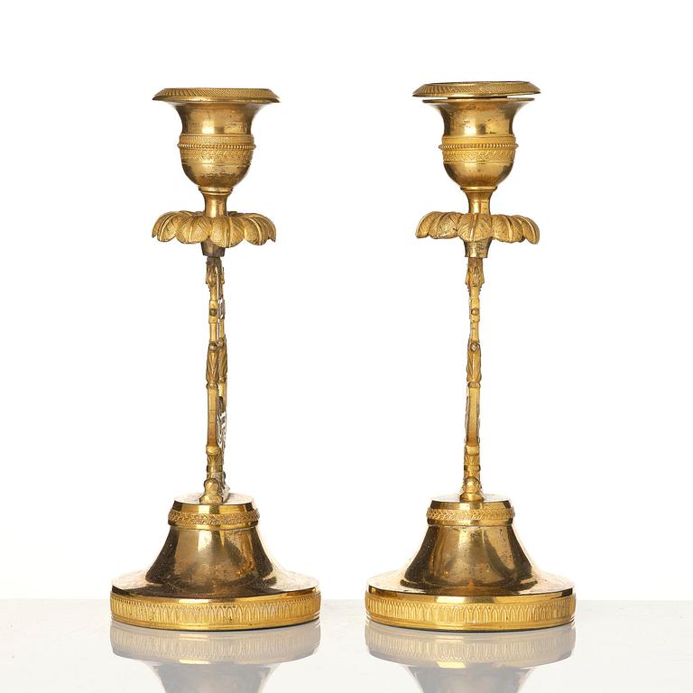 A pair of Swedish Empire ormula candlesticks.