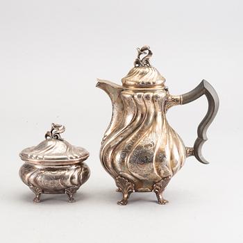 A Swedish 20th century coffeepot and suger bowl in silver mark of CG Hallberg Stockholm, total weight ca 1100 gr,