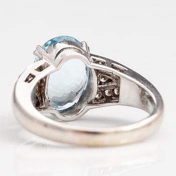 SORMUS, 18K valkokultaa, akvamariini n. 3.40 ct ja briljanttihiottuja timantteja n. 0.18 ct yht. Viro.