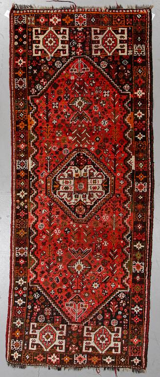 A rug, Shiraz, ca 292 x 115 cm.