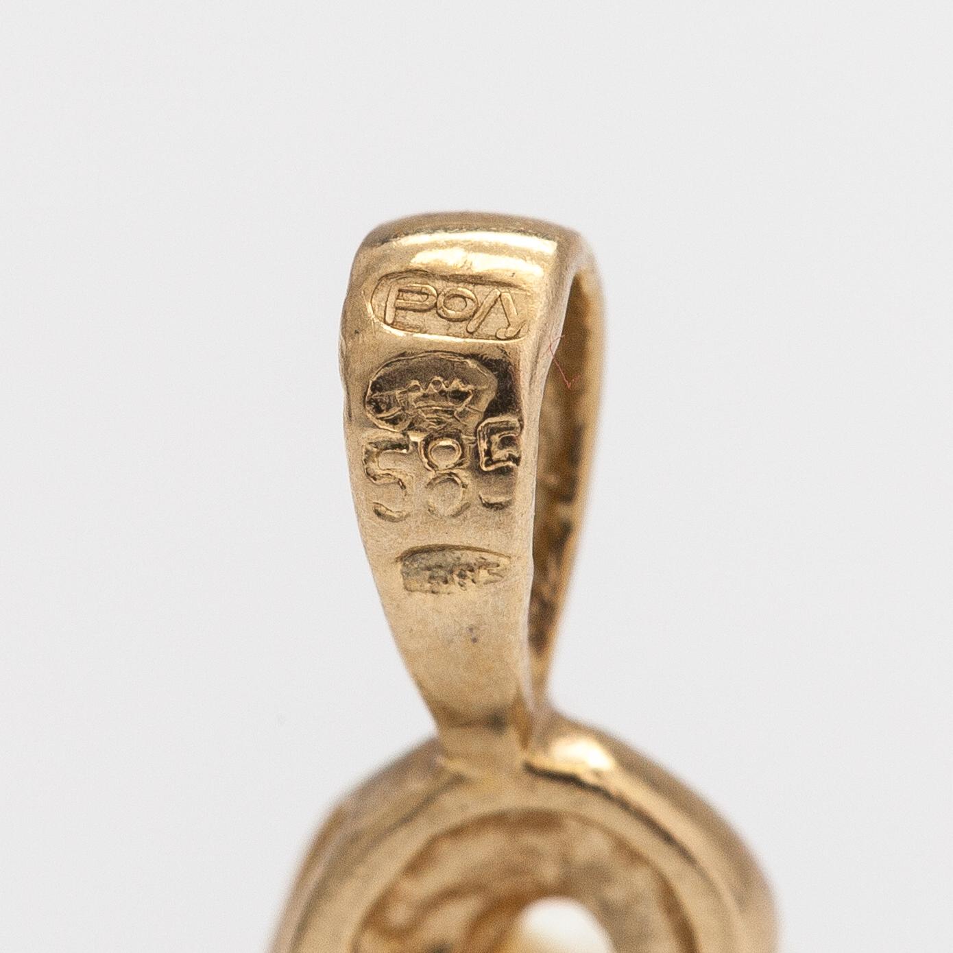 A 14K gold pendant with a cultured pearl and a diamond ca. 0.005 ct.