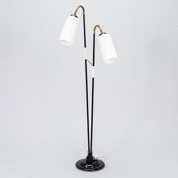 A 1950s-60s two-light floor lamp.