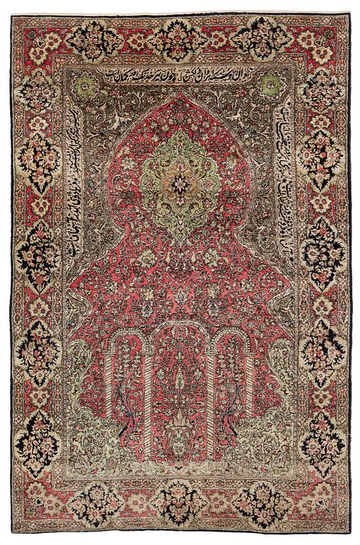 A semi-antique silk Quum, c. 216 x 141 cm.