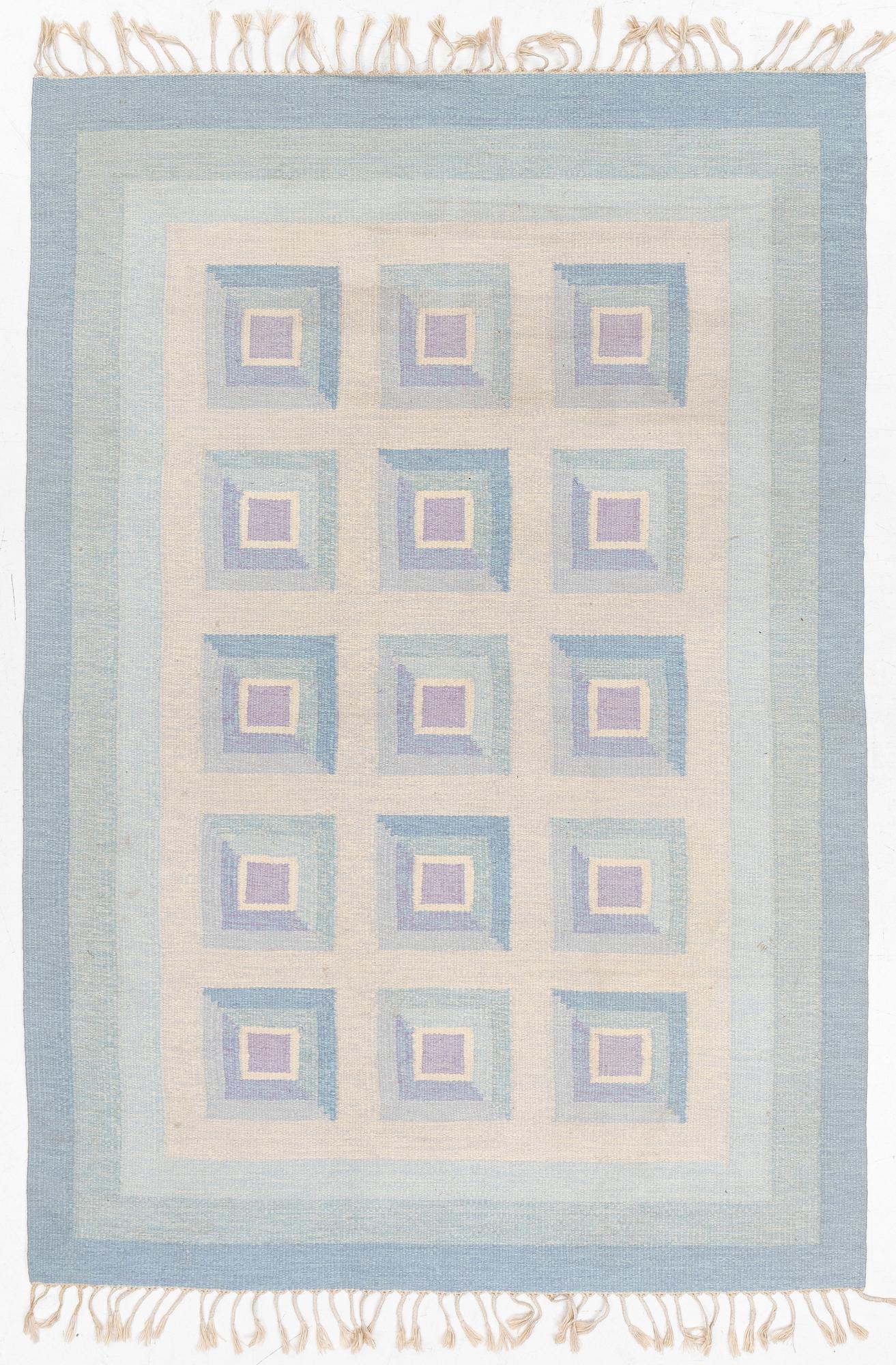 A flat weave rug, c. 240 x 163 cm.